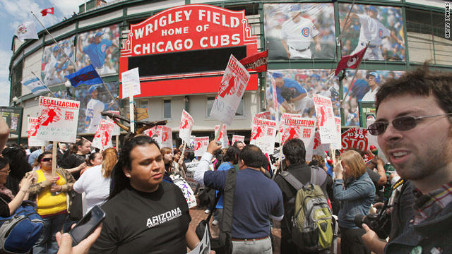 Immigrant rights supporters rally outside Wrigley Field before an 
Arizona Diamondbacks game Thursday in Chicago, Illinois.