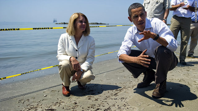 President Obama pauses during a beach tour with Lafourche Parish President Charlotte Randolph on Friday.