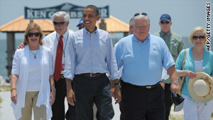 President Obama and Mississippi Gov. Haley Barbour visit the coastline.