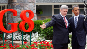 Canadian Prime Minister Stephen Harper greets President Obama in Huntsville, Ontario, on Friday.