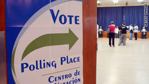 Voters wait to cast their ballots Tuesday in Miami, Florida.