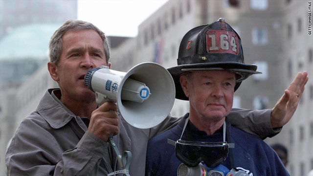 Bush with bullhorn and New York firefighter Bob Beckwith. The 9/11 attacks made his presidency's purpose clear, he writes.