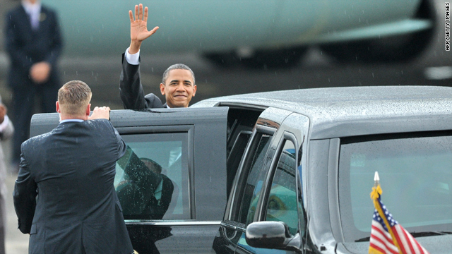 President Obama waves upon arrival at the Halim Perdana Kusuma airport in Jakarta, Indonesia, on Tuesday.