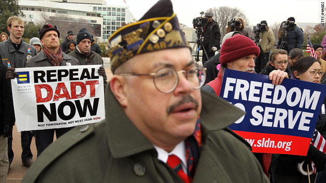 Activists listen during a December 10 rally against the military's "don't ask, don't tell" policy on Capitol Hill in Washington.
