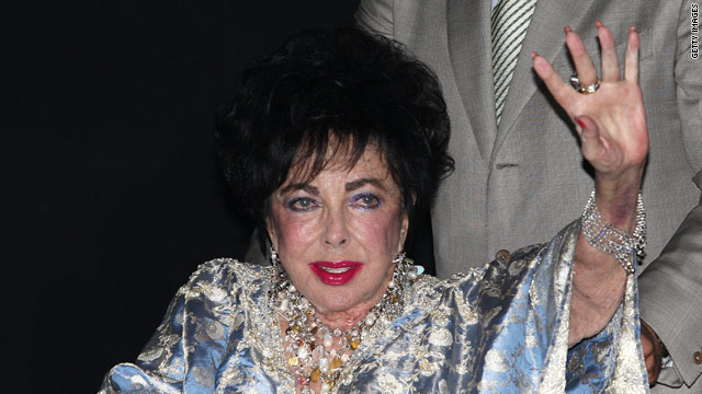 Elizabeth Taylor is denying rumors she is engaged to her manager.