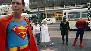 Superheroes, who sometimes ask for tips, have been targeted by Los Angeles police.