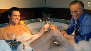 Larry King meets with actor Jim Carrey in a bathtub.