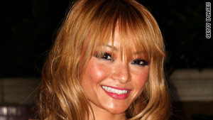 Tila Tequila says she was attacked while performing at a concert in Illinois.