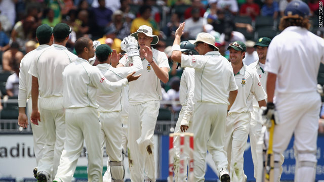 Morne Morkel (center) celebrates with team-mates after taking another wicket during South Africa's innings success.