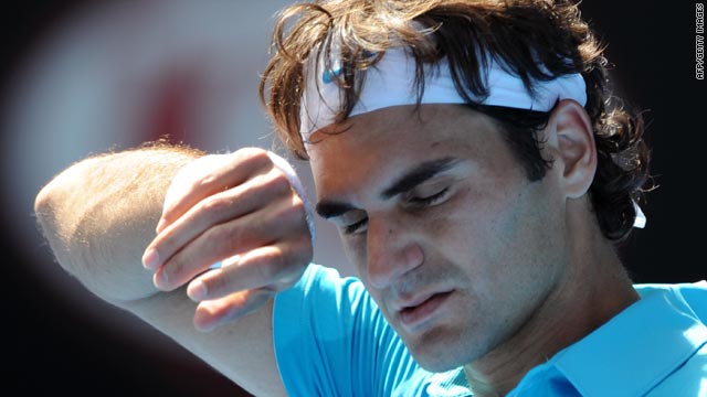 Top seed Roger Federer booked his place in the last 16 of the Australian Open with a straight sets victory over Albert Montanes.