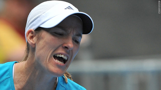 Justine Henin had a real battle before getting past compatriot Yanina Wickmayer.
