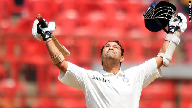Veteran batsman Sachin Tendulkar celebrates after adding yet another century to his world record on Monday.
