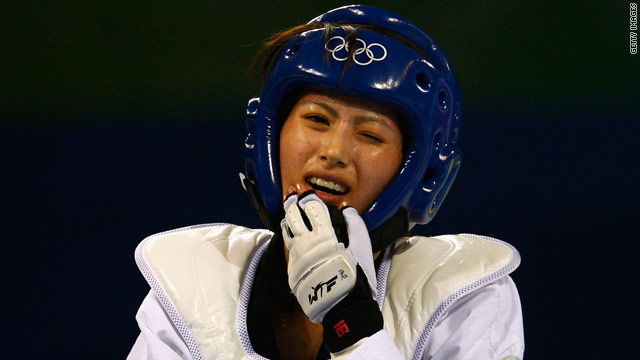 Yang Shu-Chun, pictured at the Beijing Olympics in 2008, was disqualified for wearing socks deemed to be illegal.