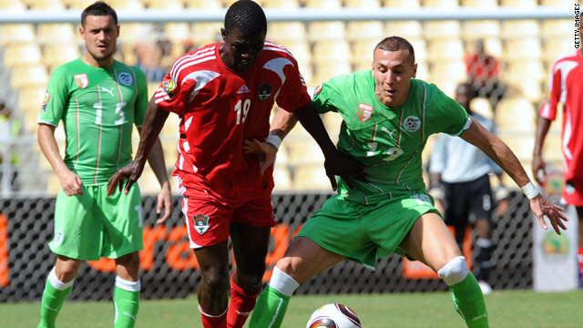 Dave Banda (center) was among the goals for Malawi in their shock 3-0 victory over Algeria.