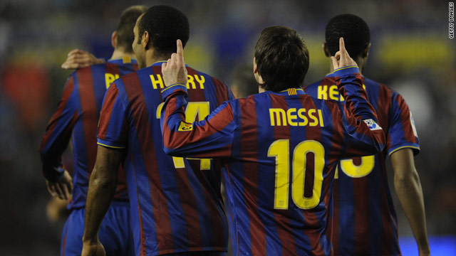 Lionel Messi points to the heavens after helping Barcelona to a 3-0 victory over Real Valladolid on Saturday.