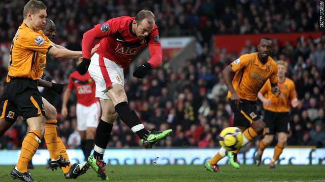 Manchester United striker Wayne Rooney helped his side to 4-0 win over Hull City which sent them top of the Premier League.