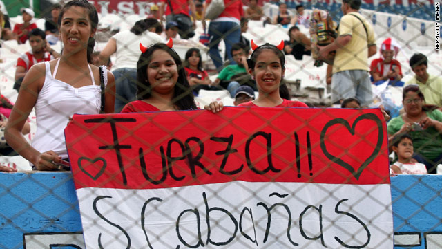 Fans show their support for striker Salvador Cabanas after he was shot in the head in Mexico City on Monday.
