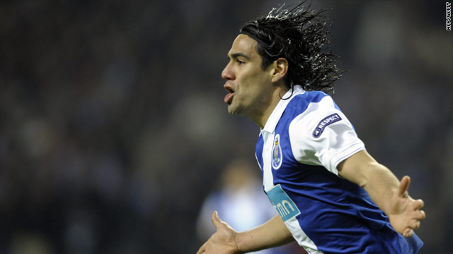 Colombian Falcao celebrates his controversial winning goal for Porto against Arsenal.