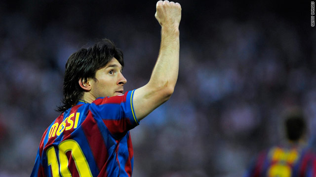 Lionel Messi celebrates his 45th goal of the season against Sevilla.