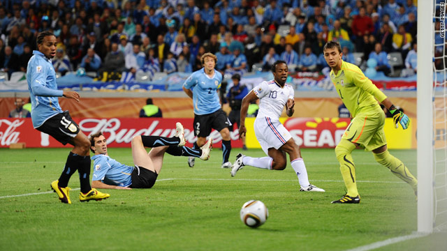 Govou (no 10) sees his early chance go agonisingly wide in the goalless draw in Cape Town.
