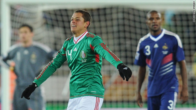 Javier Hernandez celebrates his opening goal for Mexico against France.