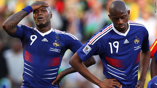 Djibril Cisse and Abou Diaby stand forlorn during France's defeat against South Africa that dumped them out of the World Cup.