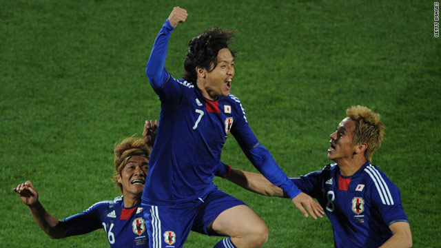 Yasuhito Endo celebrates scoring Japan's second goal from a wonderfully executed free kick.