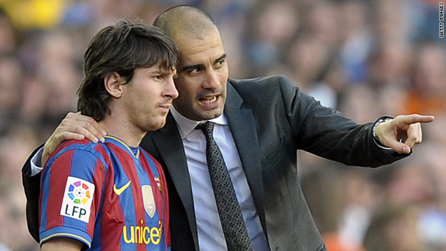 Pep Guardiola (R) with his star player at Barcelona, Argentina striker Lionel Messi.
