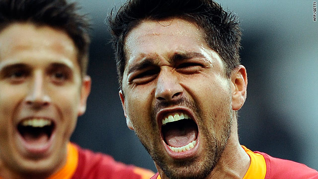 Marco Borriello shows his delight after putting Roma ahead from the penalty spot.