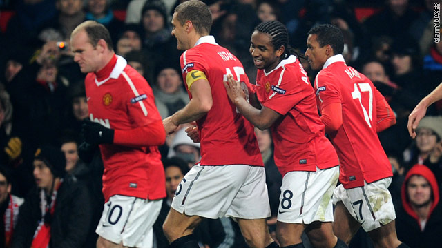 United players celebrate Anderson's equalizing goal in their 1-1 home draw against Valencia.
