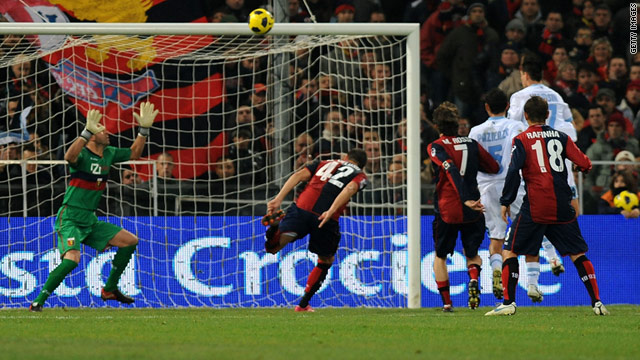 Napoli's Marek Hamsik scores the winning goal against Genoa in Saturday's Serie A match.