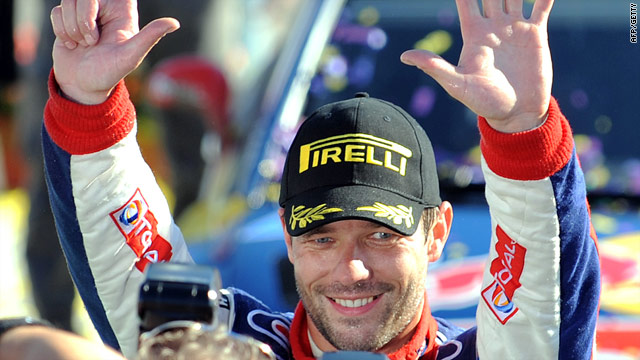 Loeb completed his home rally in triumph to seal a seventh straight world rally title.