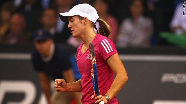 Henin swept to victory with a superb display in the deciding set in Stuttgart.