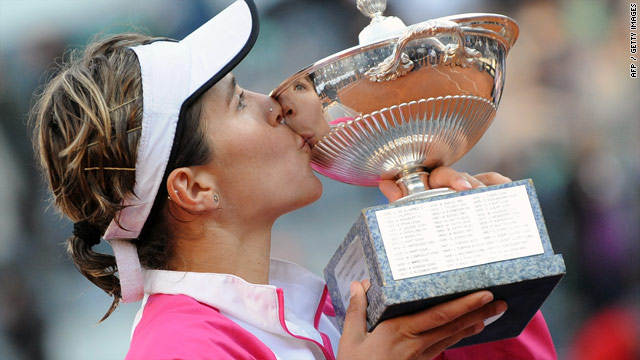 Maria Jose Martinez Sanchez kisses the winner's trophy after her win in Rome.