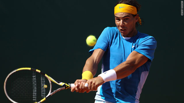 Rafael Nadal reached the quarterfinals of the Madrid Masters for a sixth successive year after beating John Isner.