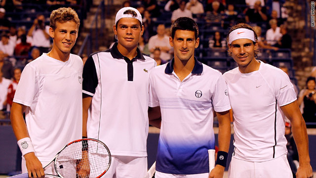 Canadian wildcards Vasek Pospisil and Milos Raonic pose with Novak Djokovic and Rafael Nadal