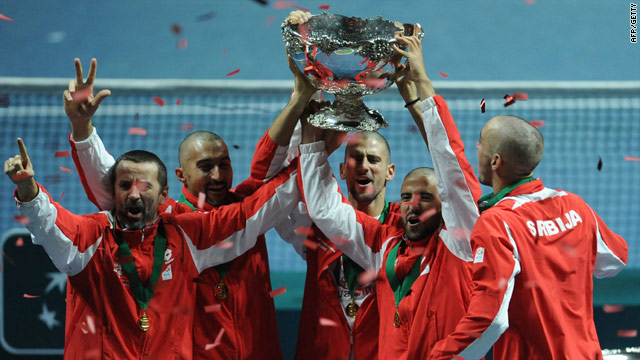 The Serbian team celebrate their remarkable Davis Cup triumph in Belgrade.