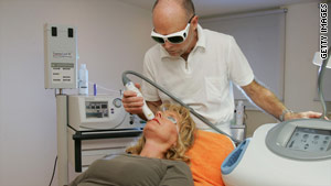 Cosmetic surgery, performed here at a clinic in Berlin, Germany, is one of many medical uses for lasers.