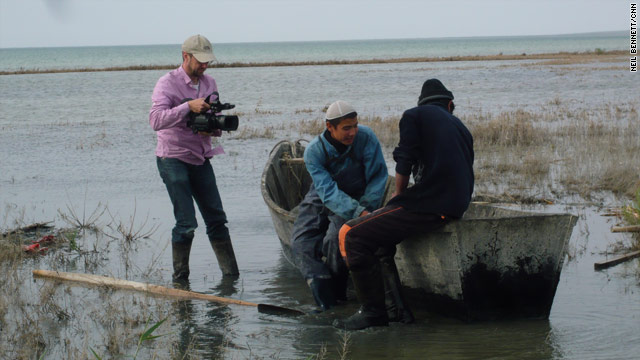 CNN's Neil Bennett films Kazak fishermen at work on the shores of the Aral Sea.