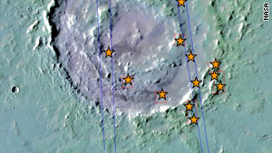 Lyot crater is 210km in diameter  - the asterisks show the locations where hydrated minerals were detected.