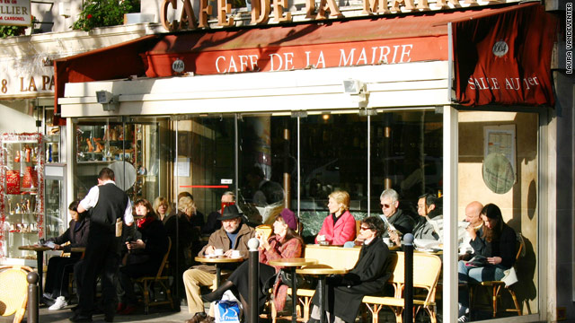 No matter the weather, many Parisians sip their coffee outside.