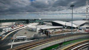 A runway overhaul and new rule on tarmac delays at John F. Kennedy International Airport are part of an air traffic debate.