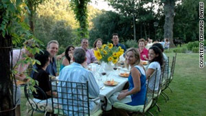 Friends and family gather for a meal at Bramasole, Frances Mayes' house in Tuscany.