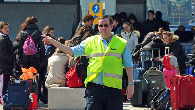 Travelers line up to buy ferry tickets to Dover at the Calais port in northern France.