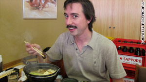 The author eats chanko, a "sumo wrestler's meal," at the restaurant at the Ryogoku Kokugikan in Tokyo.