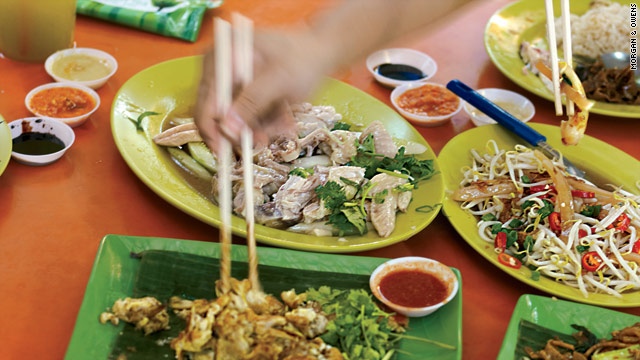At the Maxwell Food Centre in Singapore's Chinatown, travelers can sample dishes from more than 100 vendors.