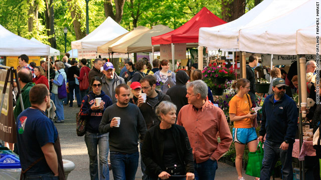 Shoppers explore the Portland Farmers Market in Portland, Oregon.