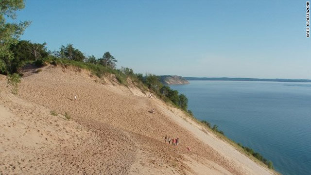 Children and adventurers may spend the afternoon climbing up and tumbling down Sleeping Bear Dunes in western Michigan.