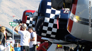 Fans check out the T6 Texans at the National Championship Air Races and Air Show on Saturday.