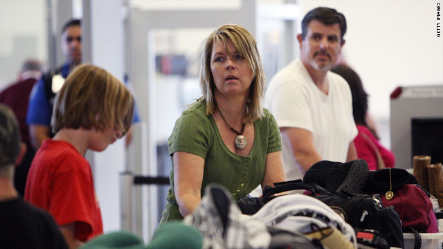 Air travelers pass through security at Los Angeles International Airport in Los Angeles, California, on Monday.